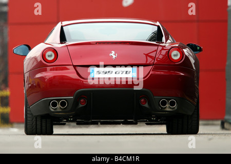 Ferrari 599 GTB Fiorano, red, model year 2006-, standing, upholding, rear view, City Stock Photo