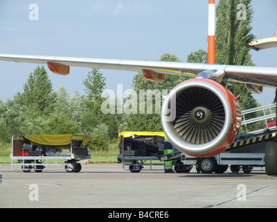 passenger luggage being transported at airport Stock Photo