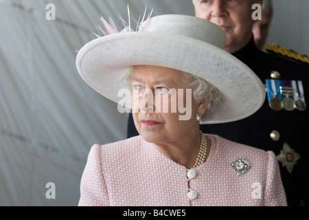 HM Queen Elizabeth II wearing a pink jacket and white wide brim hat on a visit to the Royal Artillery Regiment at Larkhill Base Stock Photo