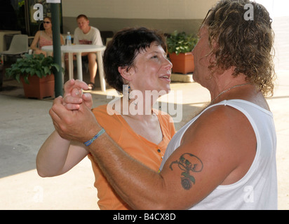 middle aged couple dancing to music at the Greenbelt Concert in Greenbelt Md Stock Photo