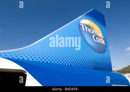 The tail plane of a Thomas Cook Boeing 757 200 holiday jet airliner at Rhodes airport Greece Stock Photo