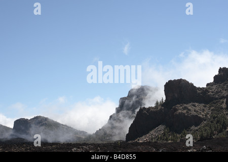 Clouds roll in over the magma from the 1798 eruption of Teide Las Canadas del Teide Tenerife Canary Islands Spain Stock Photo