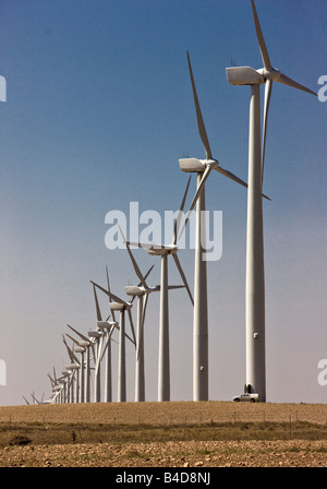 A technician attends a windmill farm near Zaragoza Spain Stock Photo
