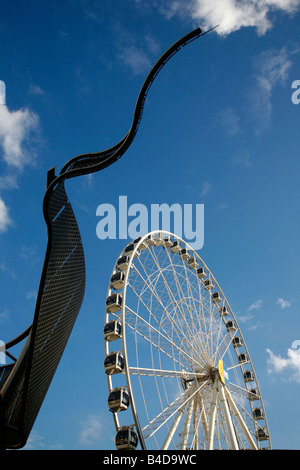 Aug 2008 - The Manchester Wheel at Exchange square and triangle shopping arcade Manchester England UK Stock Photo