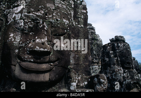 The smile of Angkor. Sculpted from stone, the smiling faces at Bayon temple are a symbol of Angkor, near Siem Reap, Cambodia. Stock Photo