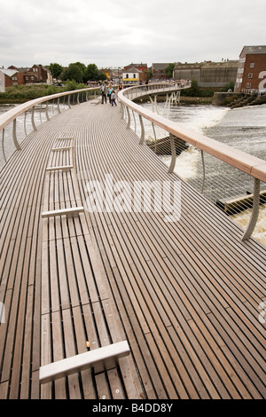 UK Yorkshire Castleford Grand Designs Big Town Plan people on new footbridge over River Aire Stock Photo