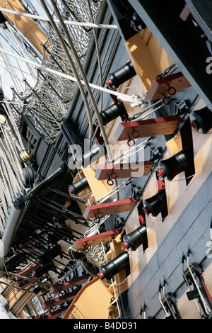 City of Portsmouth. England. Angled view of the gun ports on HMS Victory which is located at Portsmouth Historic Dockyard. Stock Photo