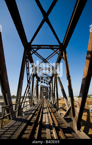 Trestle Bridge and train tracks over the Los Angeles River South Gate Los Angeles County California United States of America Stock Photo