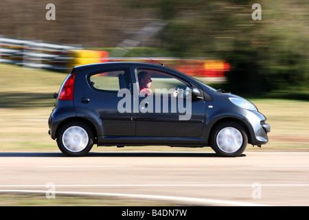Peugeot 107 Urban Move, model year 2005-, anthracite, driving, side view, test track Stock Photo