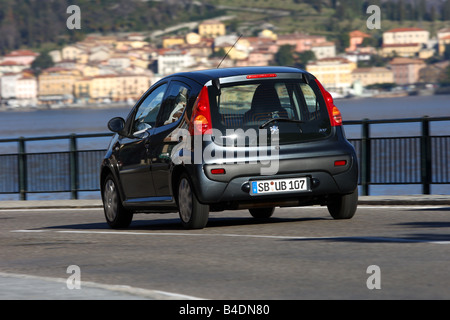 Peugeot 107 Urban Move, model year 2005-, anthracite, driving, diagonal from the back, rear view, City Stock Photo