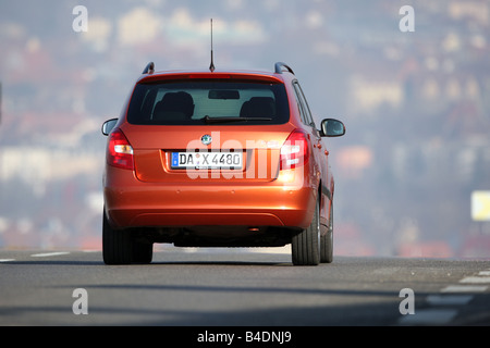 Skoda Fabia Combi 1.9 TDI Sport, model year 2007-, orange -metallic, rust-red, driving, diagonal from the back, rear view, count Stock Photo