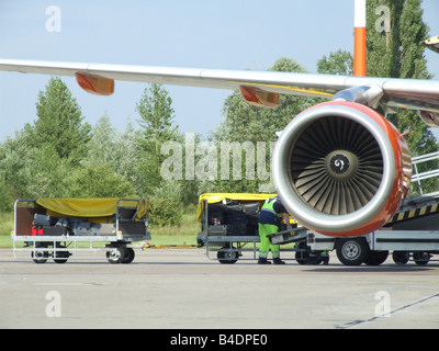 passenger luggage being transported at airport Stock Photo