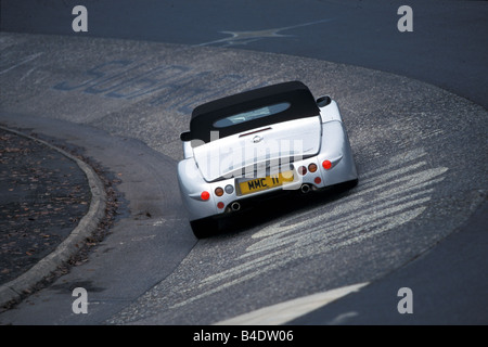 Car, Morgan Aero 8, Convertible, model year 2000, silver, driving, test track, diagonal from the back, rear view, closed top Stock Photo
