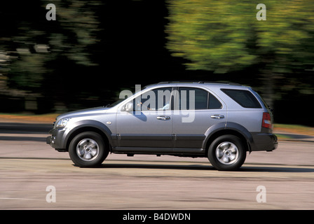Car, Kia Sorento, cross country vehicle, model year 2002-, silver, driving, side view Stock Photo