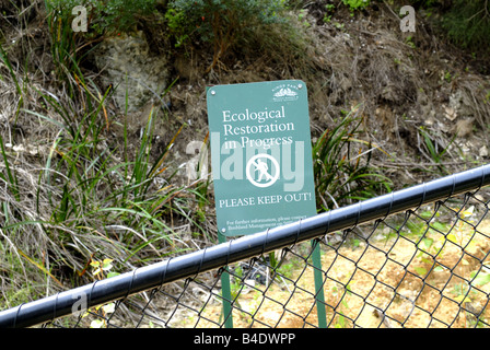 Sign informing that ecological restoration is in progress, 'Please Keep Out' Stock Photo