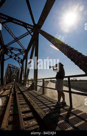 Trestle Bridge and train tracks over the Los Angeles River South Gate Los Angeles County California United States of America Stock Photo