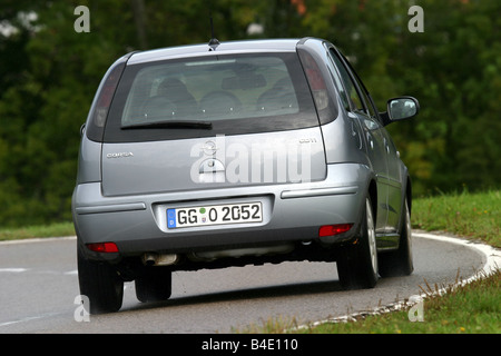 Opel Corsa 1.3 CDTI Edition, model year 2006-, black, driving, diagonal  from the back, rear view, City Stock Photo - Alamy