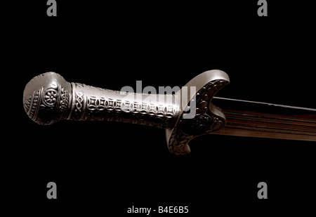 Sword hilt pommel blade and handle isolated over black Stock Photo - Alamy