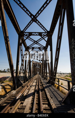 Trestle Bridge and train tracks over the Los Angeles River South Gate Los Angeles County California United States of America Stock Photo