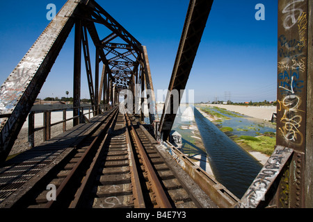 Trestle Bridge and train tracks over the Los Angeles River South Gate Los Angeles County California United States of America Stock Photo