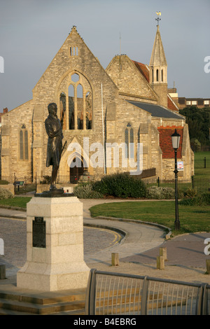 City of Portsmouth, England. The derelict Old Garrison Church at Old Portsmouth with the Lord Nelson statue in the foreground. Stock Photo