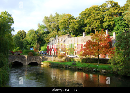 Bridge over River Coln in autumn, Bibury, Gloucestershire, England, United Kingdom Stock Photo