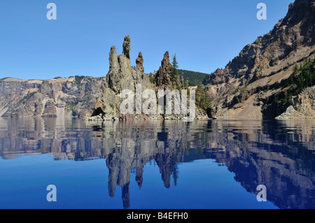 Close up view of the Phantom Ship, a volcanic rock tips above the lake surface. The Crater Lake National Park, Oregon, USA. Stock Photo