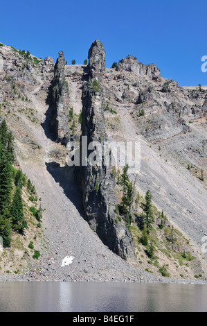 The Devil's Backbone, a vertical dike cut across the rim. The Crater Lake National Park, Oregon, USA. Stock Photo