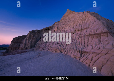 Formations of Castle Butte during dusk in Big Muddy Badlands, Southern Saskatchewan, Canada. Stock Photo