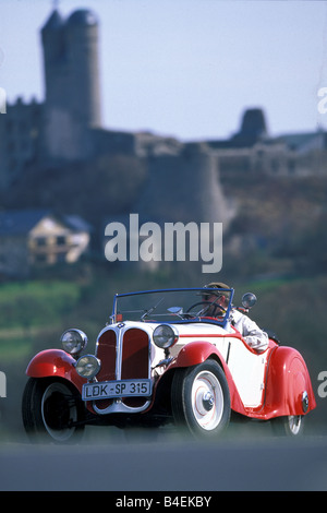 Car, BMW 315, 1, Roadster, vintage car, model year 1935-1936, 1930s, thirties,  red-white,  driving, diagonal front, front view, Stock Photo