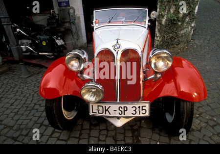 Car, BMW 315, 1, Roadster, vintage car, model year 1935-1936, 1930s, thirties,  red-white,  standing, diagonal front, front view Stock Photo