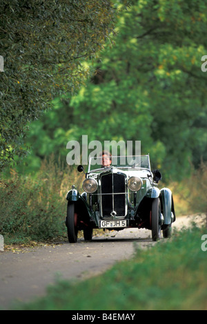 Car, Rover 10, 25 Nizam Sports, model year 1931-1032, dark-green,  vintage car, 1930s, thirties,  driving, diagonal front, front Stock Photo
