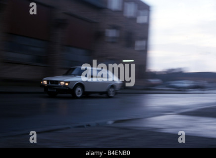 Car, Saab 99 turbo, white, old car, driving, diagonal front, front view, blurred, side view, photographer: Reinhard Mutschler Stock Photo