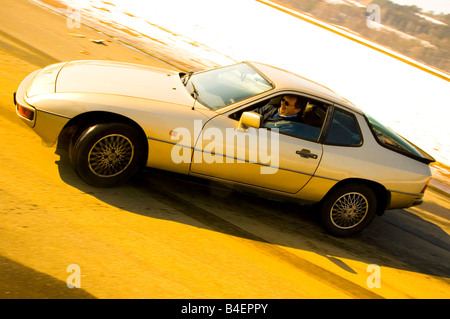 Car, Porsche 924, model year 1977, beige-metallic, Coupé ,  Coupe, old car, standing, side view, photographer: Hardy Mutschler Stock Photo