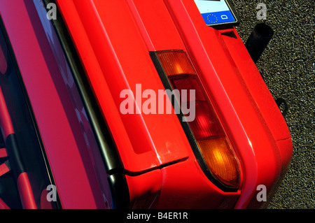 Car, Opel Manta B, model year 1983, red, Coupé, Coupe, old car, 1980s, eighties, detail, details, backlight, technics, technical Stock Photo