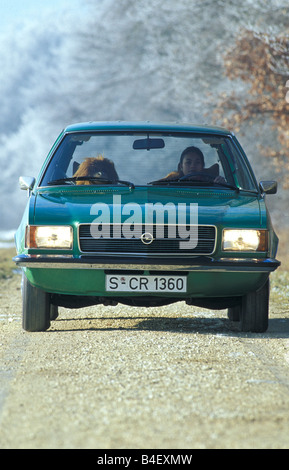 Car, Opel Rekord D 2000 Caravan, wagon, model year 1972-1977, old car,  green, driving, front view, road, country road Stock Photo