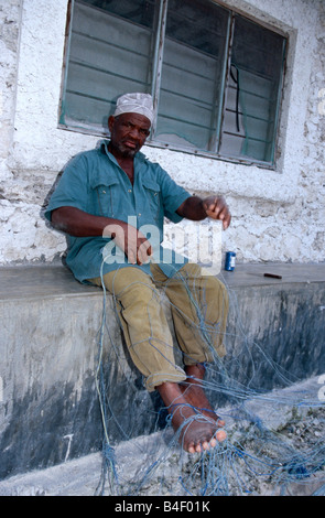 Man repairing fishing net, portrait, South Africa, Africa Stock Photo