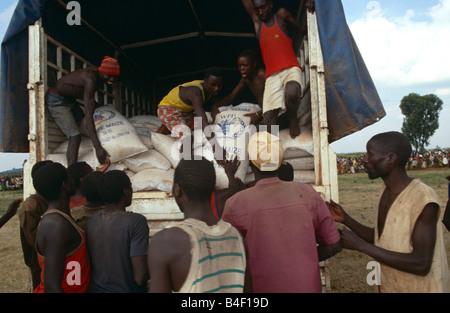 Unloading sacks of WFP supplies for distribution in Burundi. Stock Photo