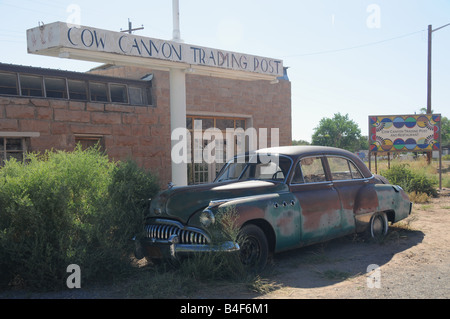 An old Buick Eight otside of the Cow Canyon Trading Post, alondside Federal Highway 191, Bluff, Utah. Stock Photo