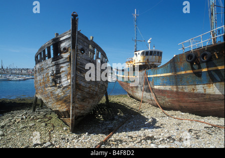 Rusted Shipwrecks in Harbour of Camaret sur Mer Brittany France Stock Photo