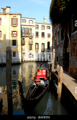 Gondola in small canal Venice Italy Stock Photo