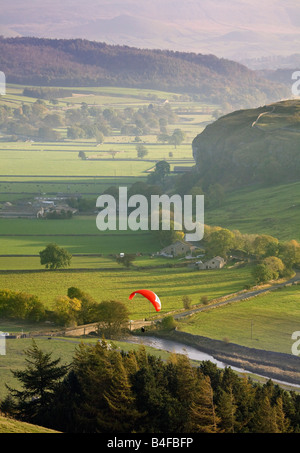 Hang Gliding from Hawkswick into Wharfedale and towards Kilnsey Cragg, Yorkshire Dales National Park. Stock Photo