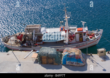 Aerial View of a Large Greek Fishing Boat Tied Up in Harbour at Platis Gialos Isle of Sifnos Aegean Sea Cyclades Islands Greece Stock Photo