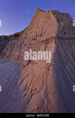 Formations of Castle Butte during dusk in Big Muddy Badlands, Southern Saskatchewan, Canada. Stock Photo