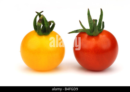 Red and yellow tomato fruit isolated on white background Stock Photo