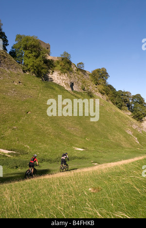 Mountain biking through Cavedale Castleton Peak District National Park Derbyshire England UK GB Stock Photo