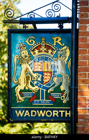 Typical English hanging pub sign for the King's Arms Stock Photo