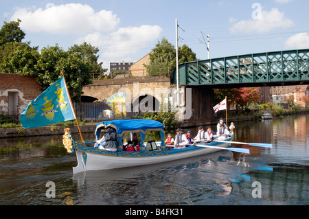 UK- Schoolchildren sailing during habitat studies projects at Lee River Valley nature reserve in London Photo © Julio Etchart Stock Photo