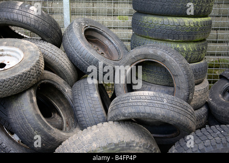 Old tyres waiting to be recycled. Stock Photo