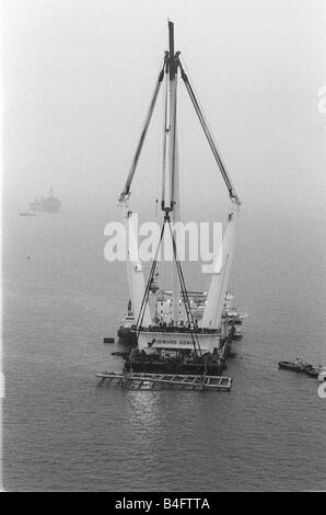 Raising The Mary Rose October 1982 The Salavage Barge lifting King Henry VIII flagship The Mary Rose off the sea bead just off Southsea The Mary Rose sunk in 1545 Stock Photo